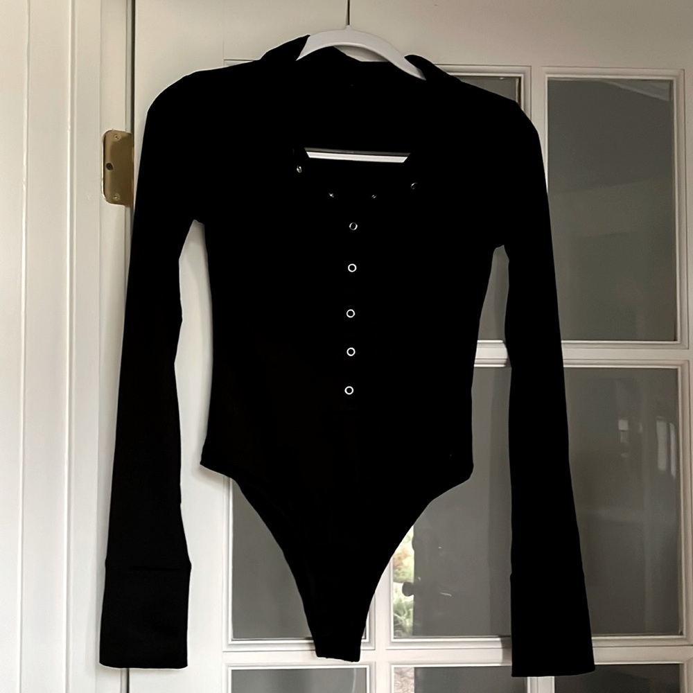 Sexy Black bodysuit with seven snap buttons in front. Long sleeve. Never worn. - Picture 2 of 5
